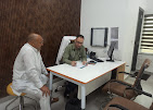Doctor speaking with an elderly patient